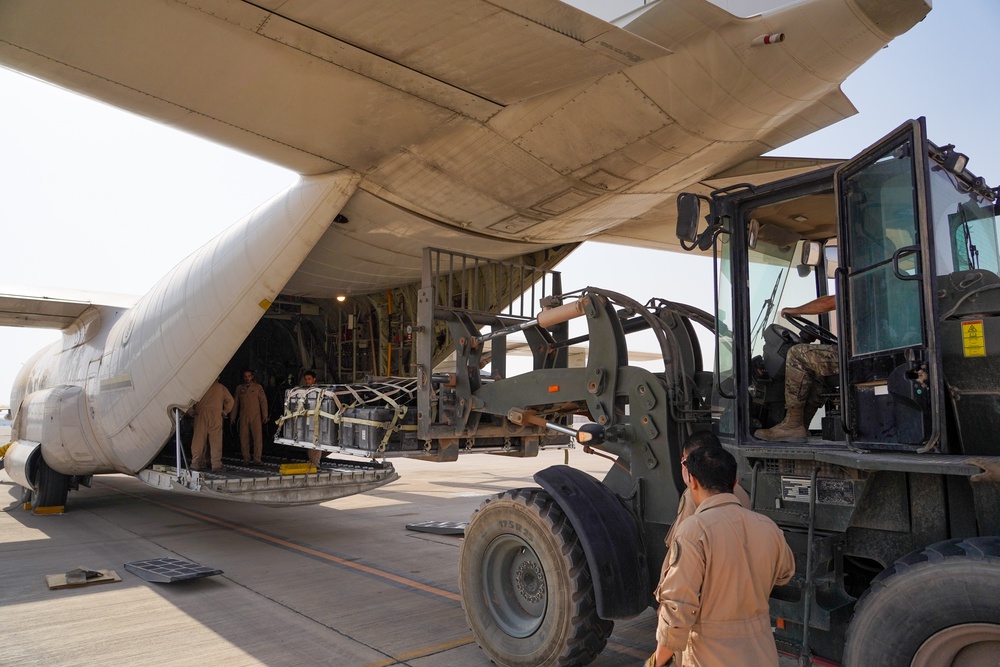 378th ELRS and RSAF load C-130 in preparation for Operation Agile Spartan