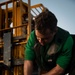 USS Carl Vinson (CVN 70) Sailors Perform Maintenance on the Flight Deck in the Pacific Ocean