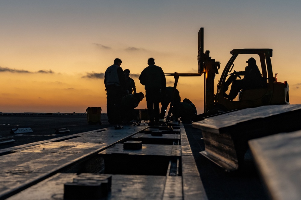 USS Carl Vinson (CVN 70) Sailors Perform Maintenance on the Flight Deck in the Pacific Ocean