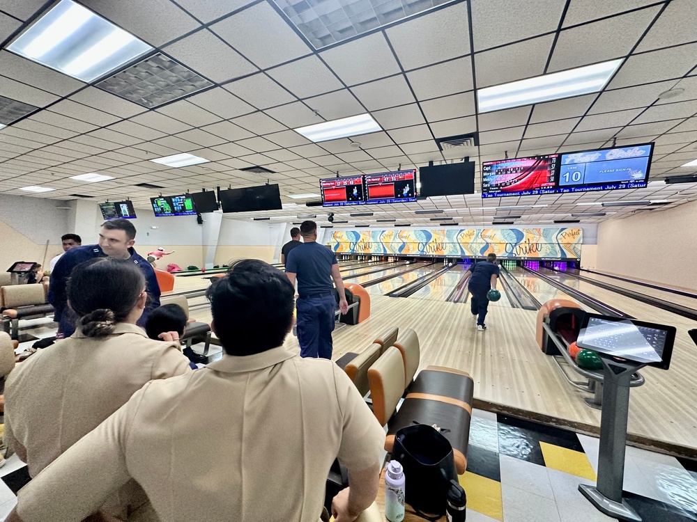 USMMA cadets participate in a U.S. Coast Guard Forces Micronesia/Sector Guam wardroom event