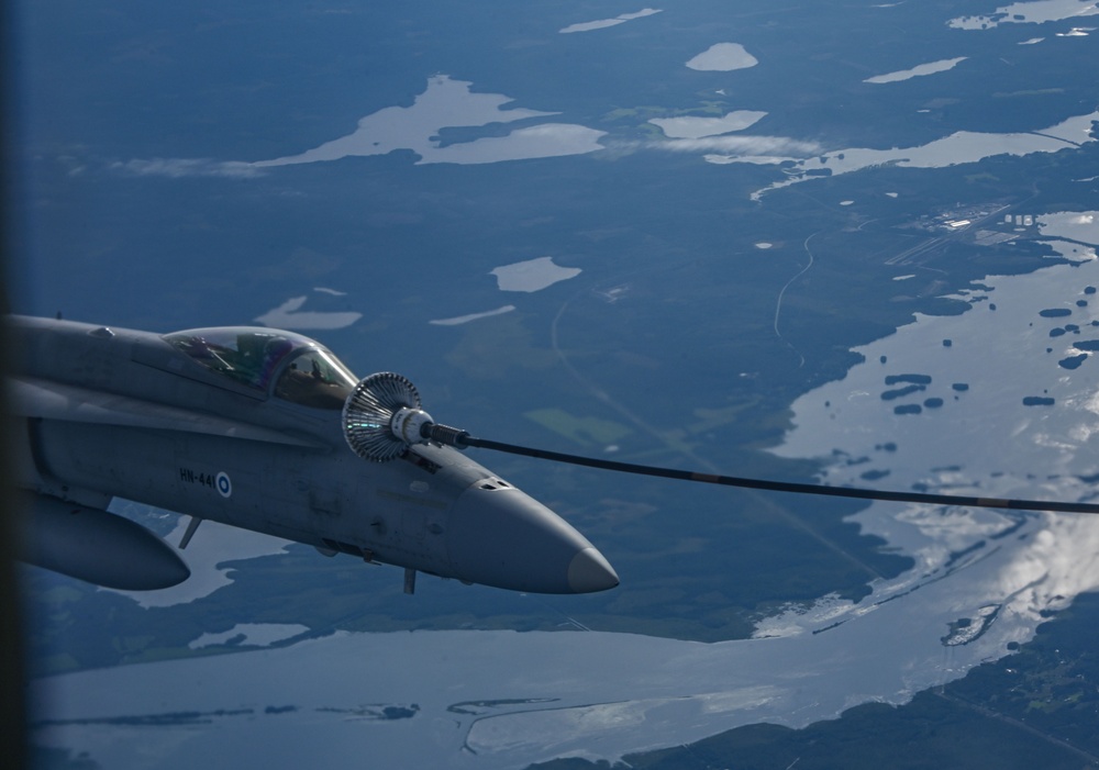 A U.S. F-16 and Finnish F-18 fly into a gas station…