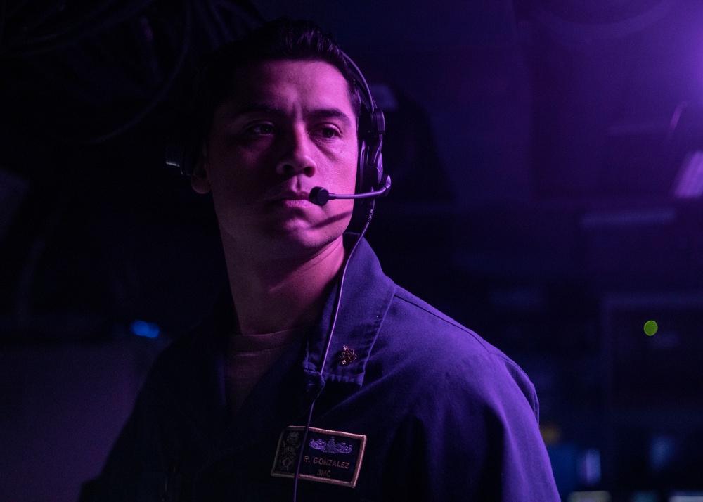 Sailors Stand Watch in the Combat Information Center aboard USS John Finn (DDG 113), Aug. 10