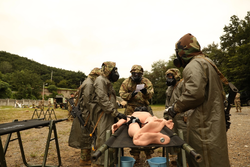 65th Medical Brigade conducts simulated decontamination training.