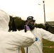 65th Medical Brigade conducts simulated decontamination training.