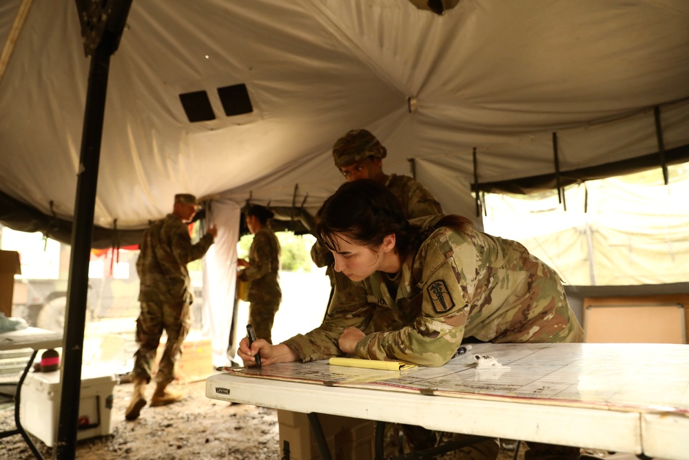 65th Medical Brigade conducts simulated decontamination training.