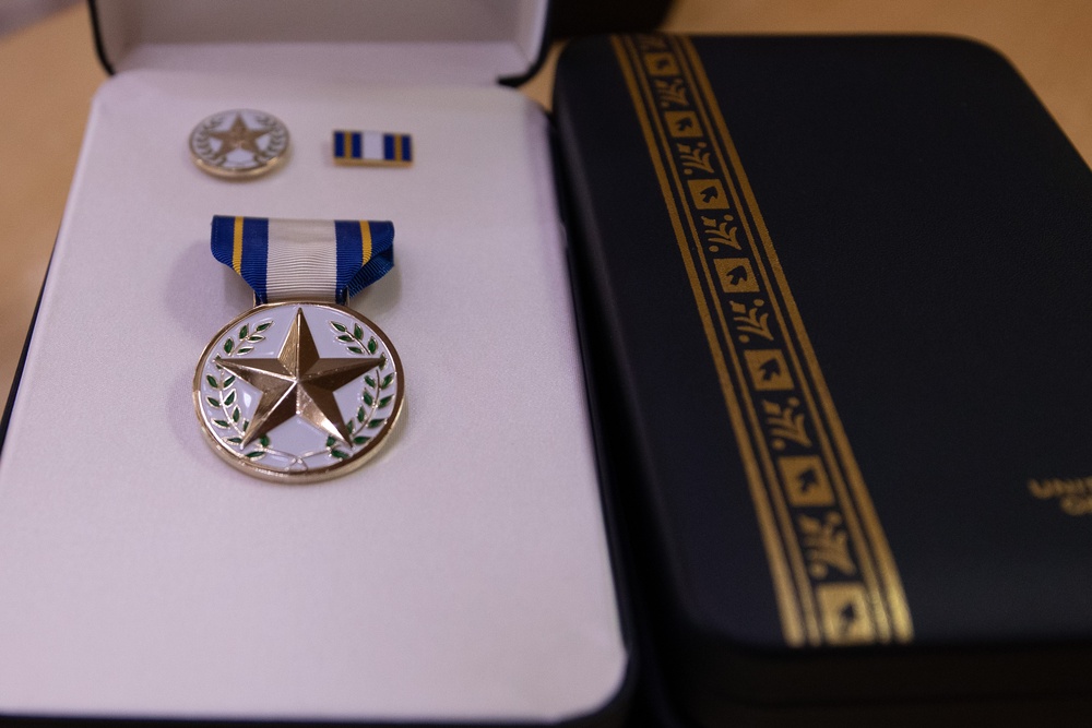 Massachusetts Families of fallen service members receive medals of Liberty and Fidelity.