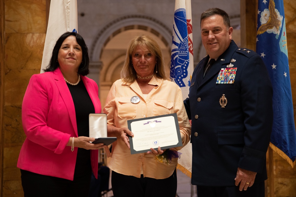 Massachusetts Families of fallen service members receive medals of Liberty and Fidelity.