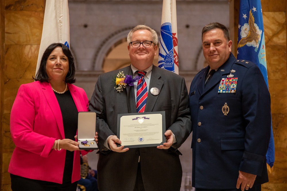 Massachusetts Families of fallen service members receive medals of Liberty and Fidelity.