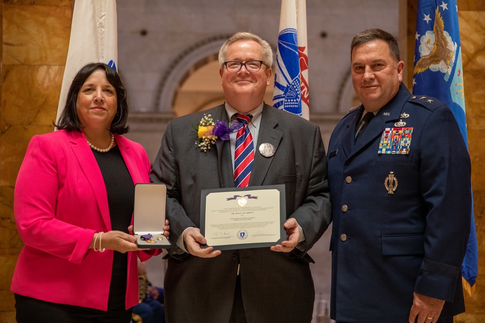 Massachusetts Families of fallen service members receive medals of Liberty and Fidelity.