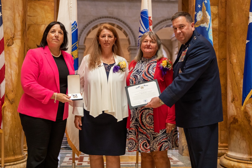 Massachusetts Families of fallen service members receive medals of Liberty and Fidelity.