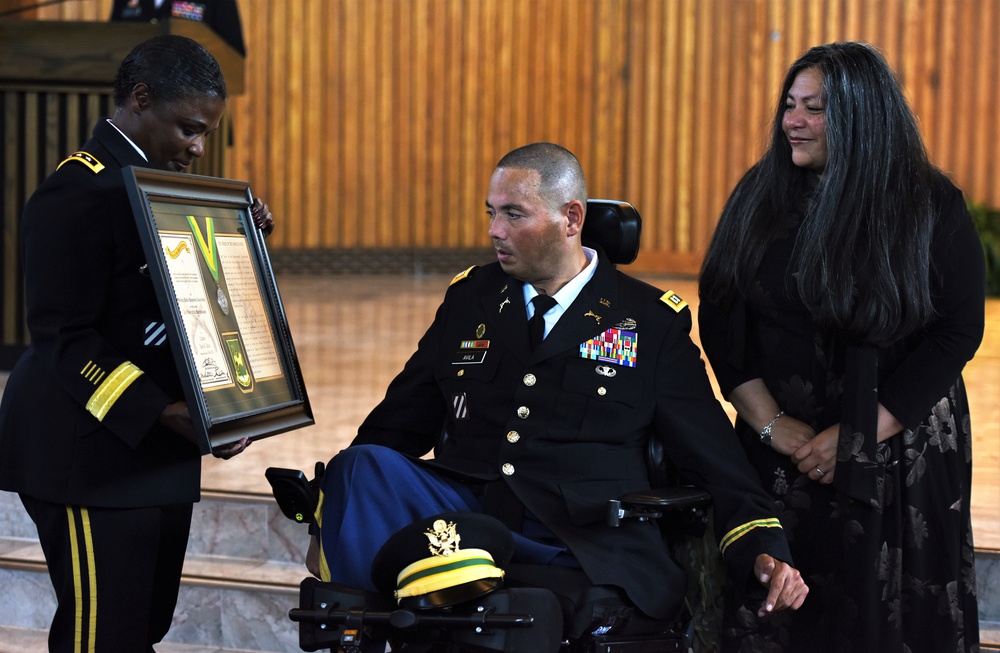 Wounded warrior receives one of the highest military police honors