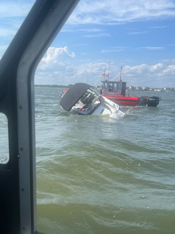 Coast Guard rescues 4 people, dog from sinking boat in Barnegat Bay, New Jersey