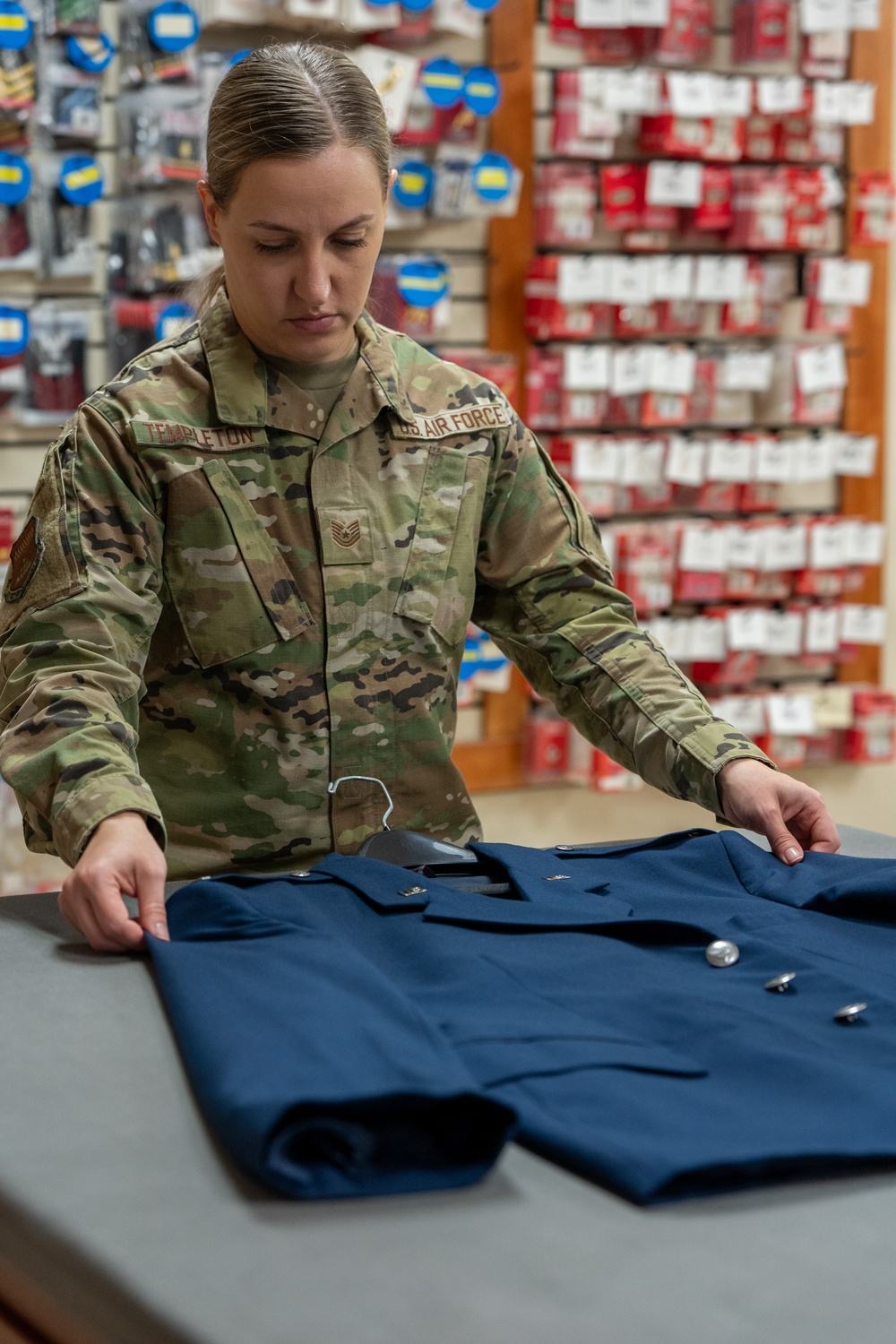 AFMAO uniforms section assists with instructional video