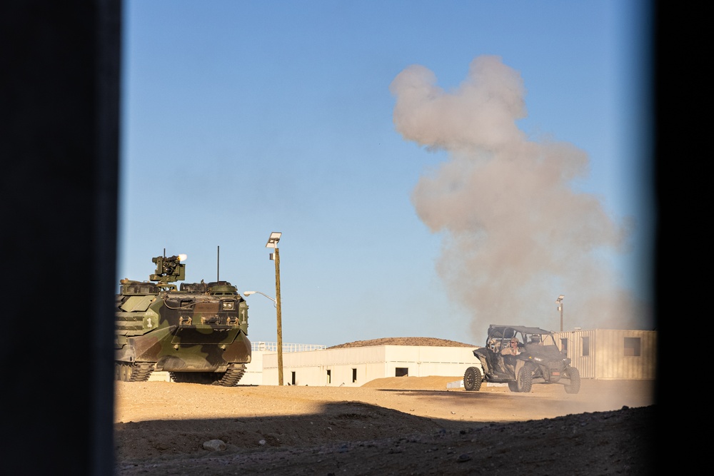 Marines with 3/7, 3rd AAB, 1st CEB conduct a mechanized assault on an urban environment during AFX 5-23