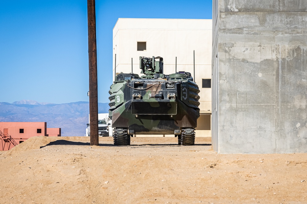 Marines with 3/7, 3rd AAB, 1st CEB conduct a mechanized assault on an urban environment during AFX 5-23