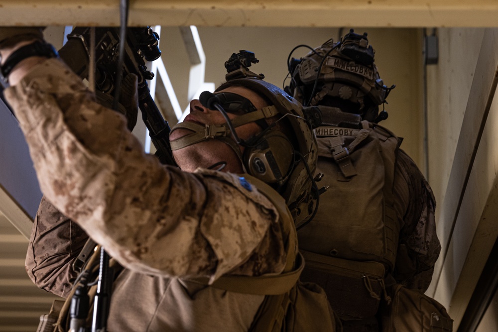 Marines with 3/7, 3rd AAB, 1st CEB conduct a mechanized assault on an urban environment during AFX 5-23