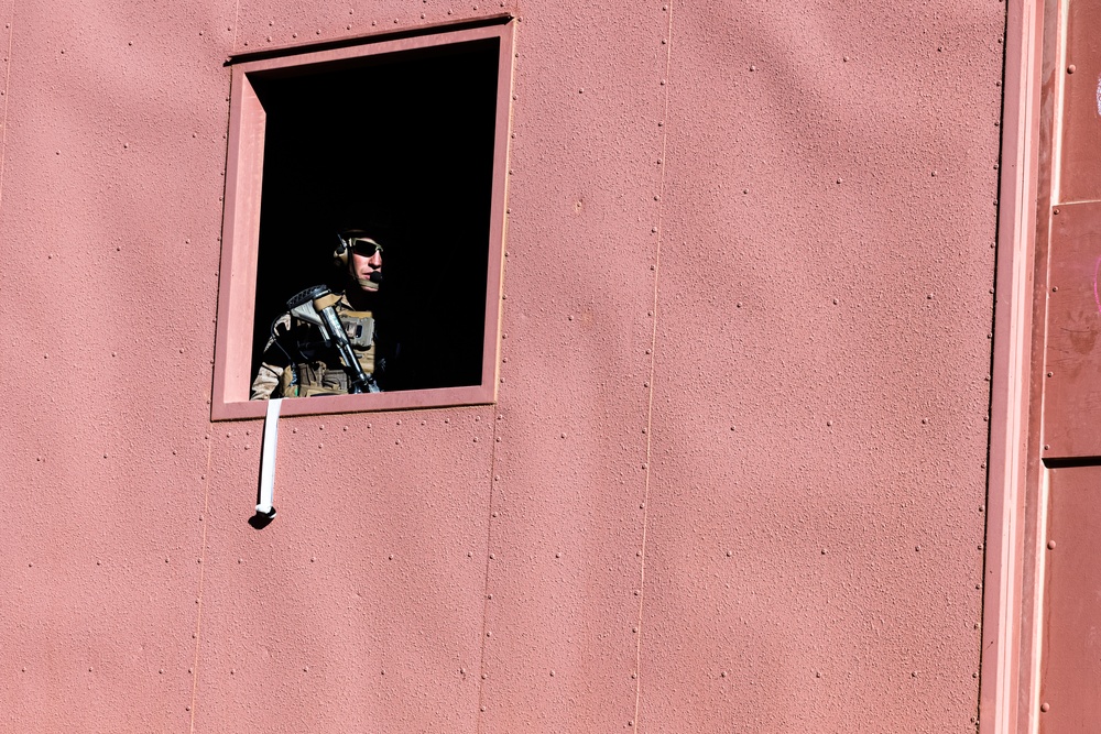 Marines with 3/7, 3rd AAB, 1st CEB conduct a mechanized assault on an urban environment during AFX 5-23