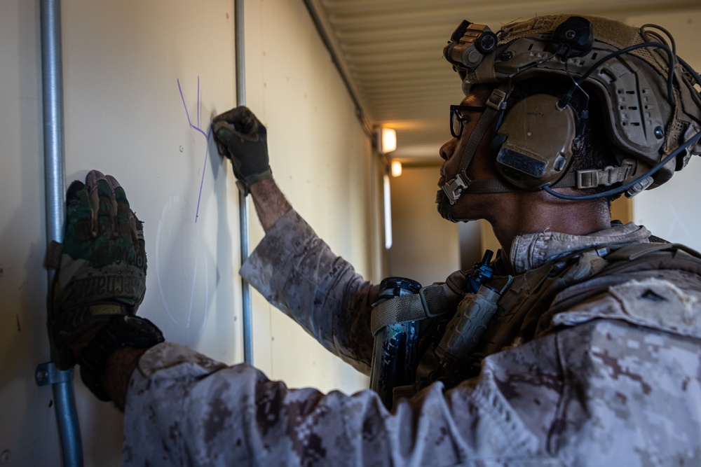 Marines with 3/7, 3rd AAB, 1st CEB conduct a mechanized assault on an urban environment during AFX 5-23