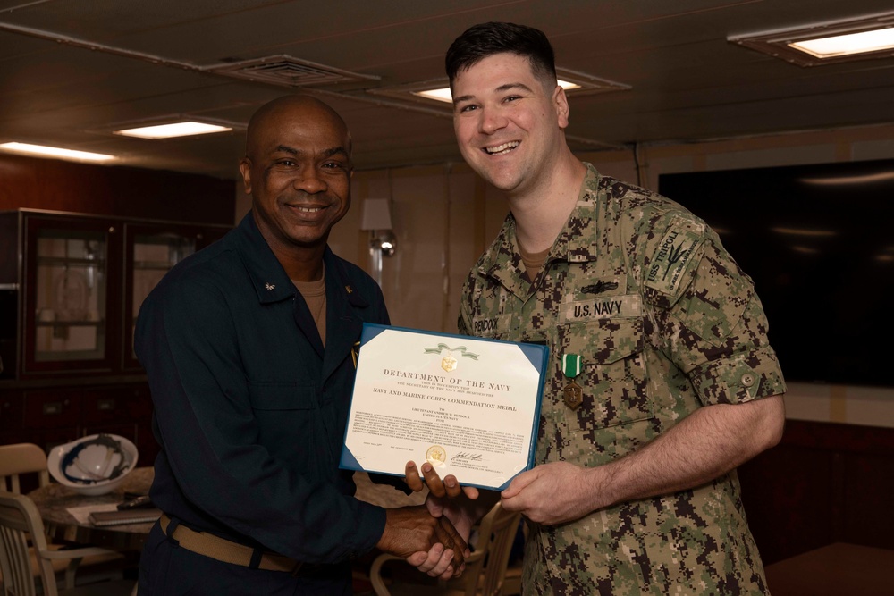 LT Pendock award and pipeing ashore