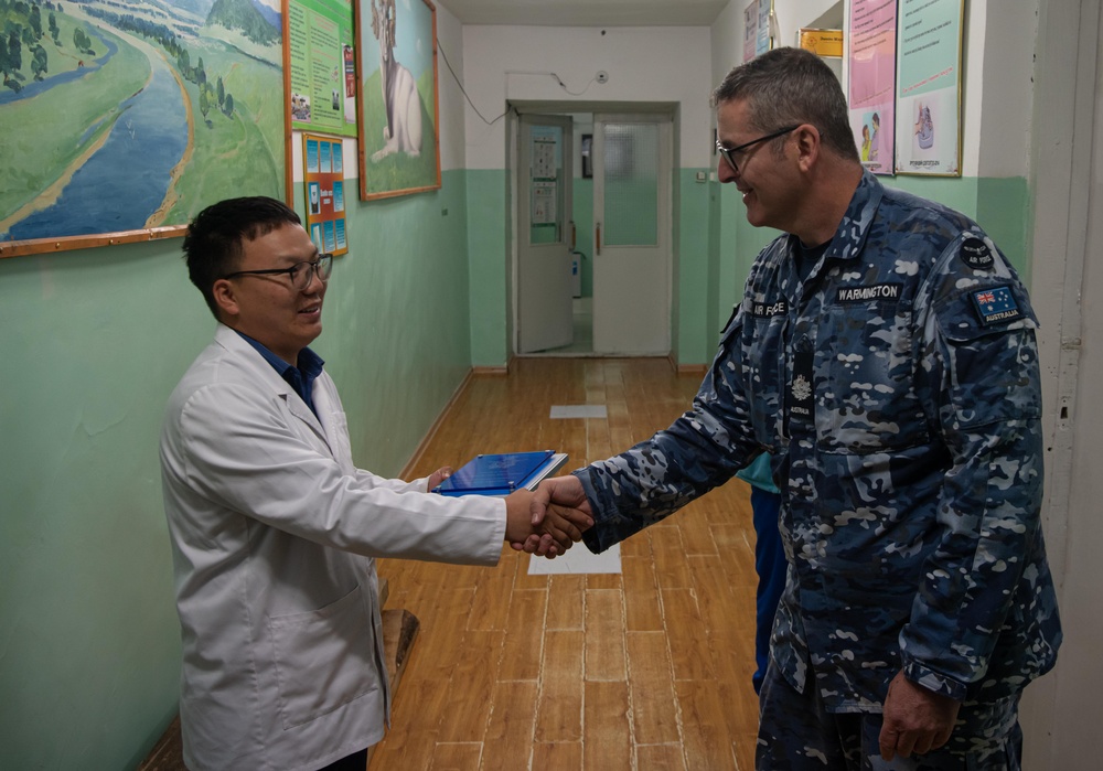 PAC-Angel 23-2 team presents plaque to local hospital