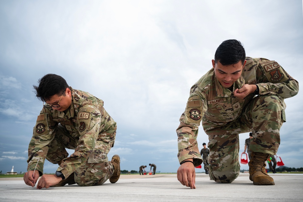 8th Fighter Wing conducts combined FOD Walk to welcome F-16s home