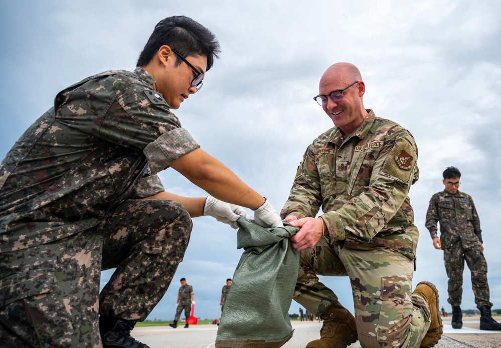 8th Fighter Wing conducts combined FOD Walk to welcome F-16s home