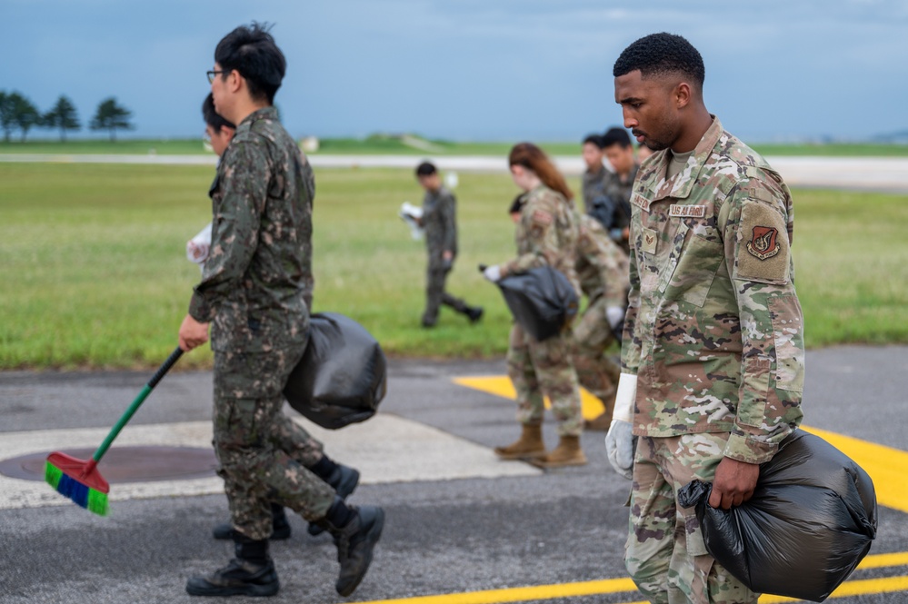 8th Fighter Wing conducts combined FOD Walk to welcome F-16s home