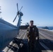 U.S. Navy Sailor Preforms Preflight Checks