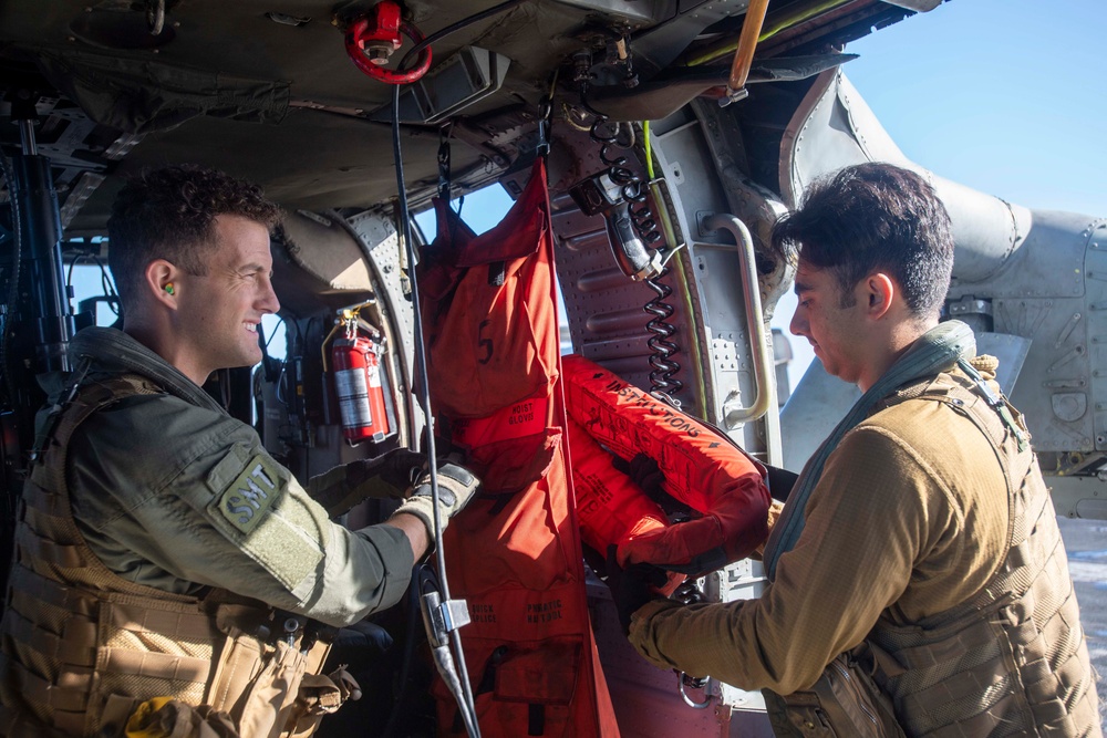 U.S. Navy Sailors Preform Preflight Checks