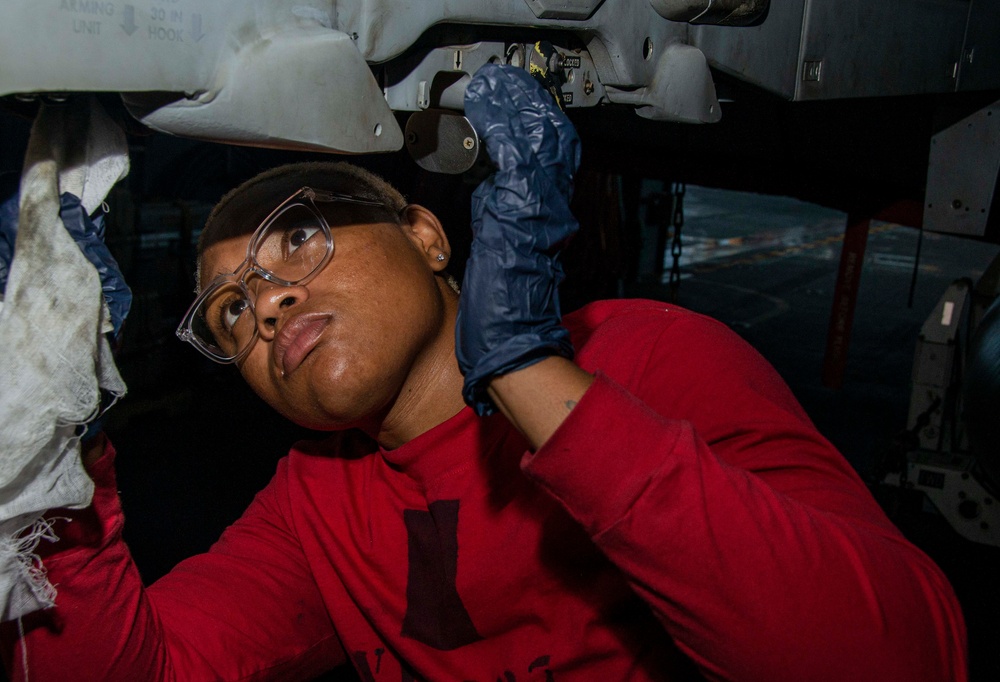 Sailor Performs Maintenance