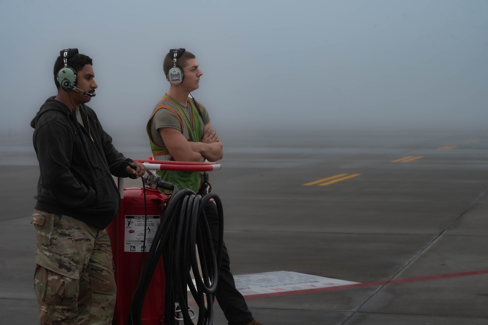 Team Minot completes pre-flight operations in foggy conditions