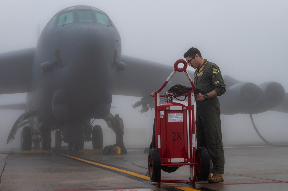 Team Minot completes pre-flight operations in foggy conditions