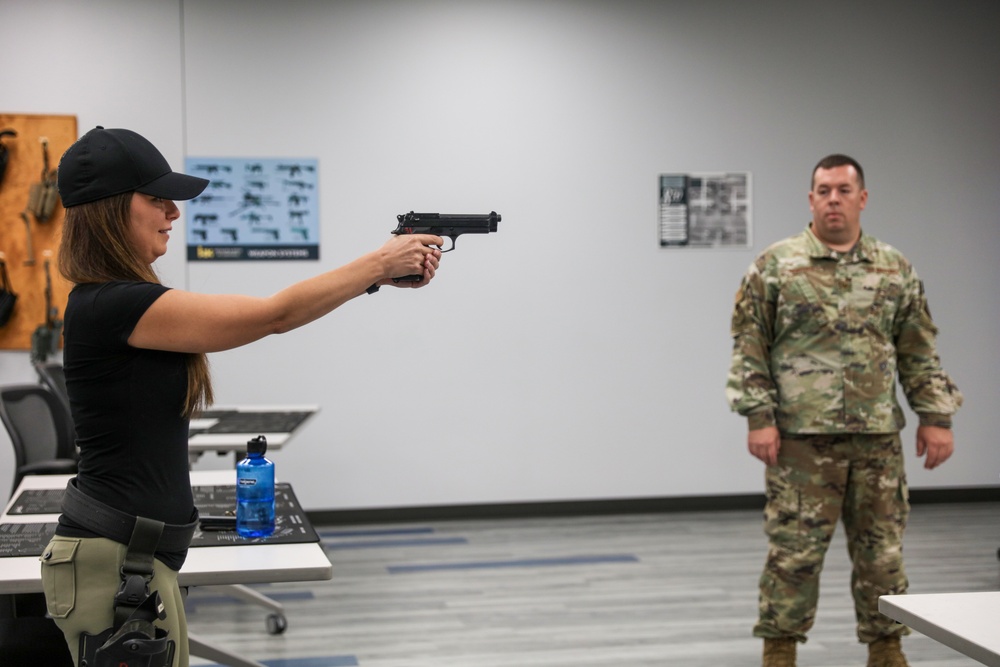 445th AW defender provide small arms training to AFLCMC deployer
