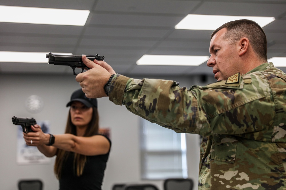 445th AW defender provide small arms training to AFLCMC deployer