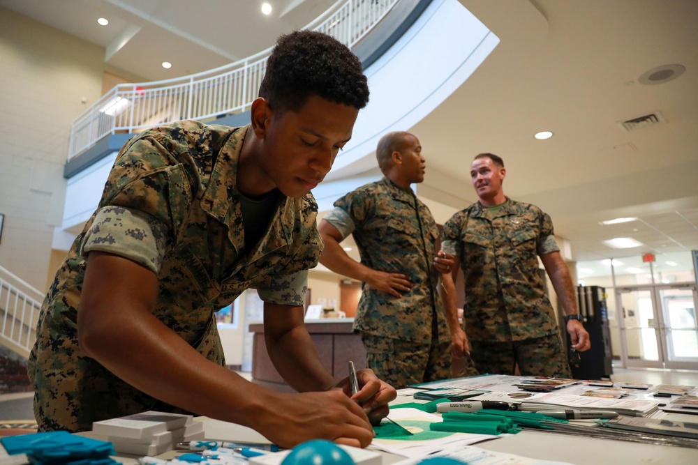 Marines participate in a Green Flag Initiative to foster healthy relationships