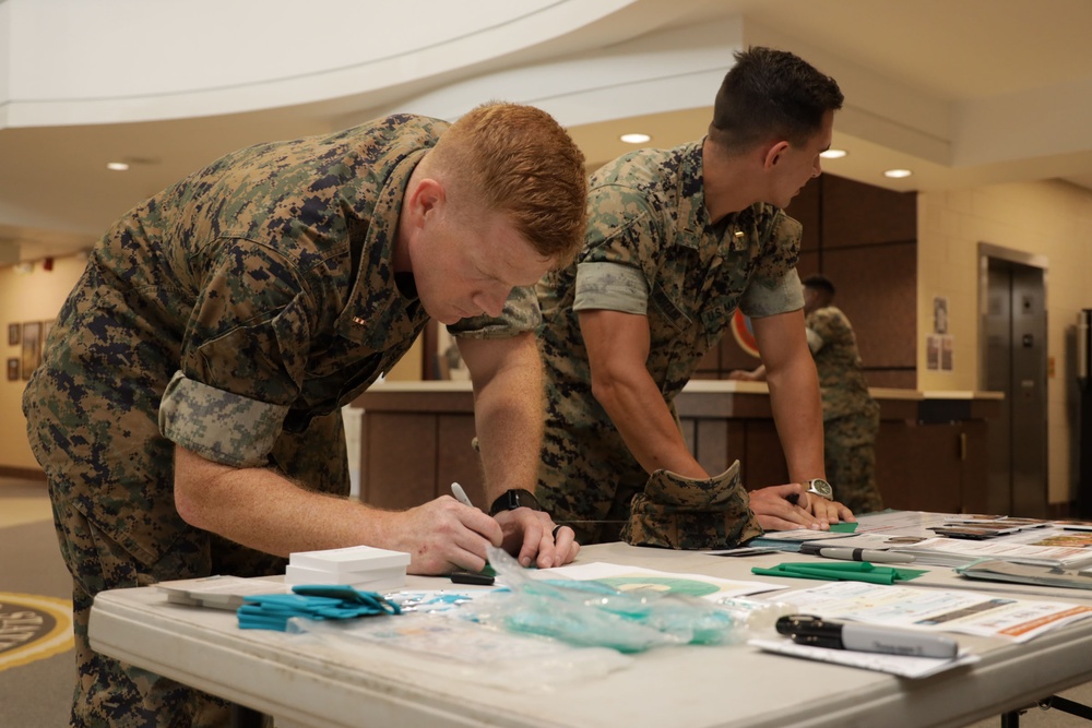 Marines participate in a Green Flag Initiative to foster healthy relationships