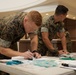 Marines participate in a Green Flag Initiative to foster healthy relationships