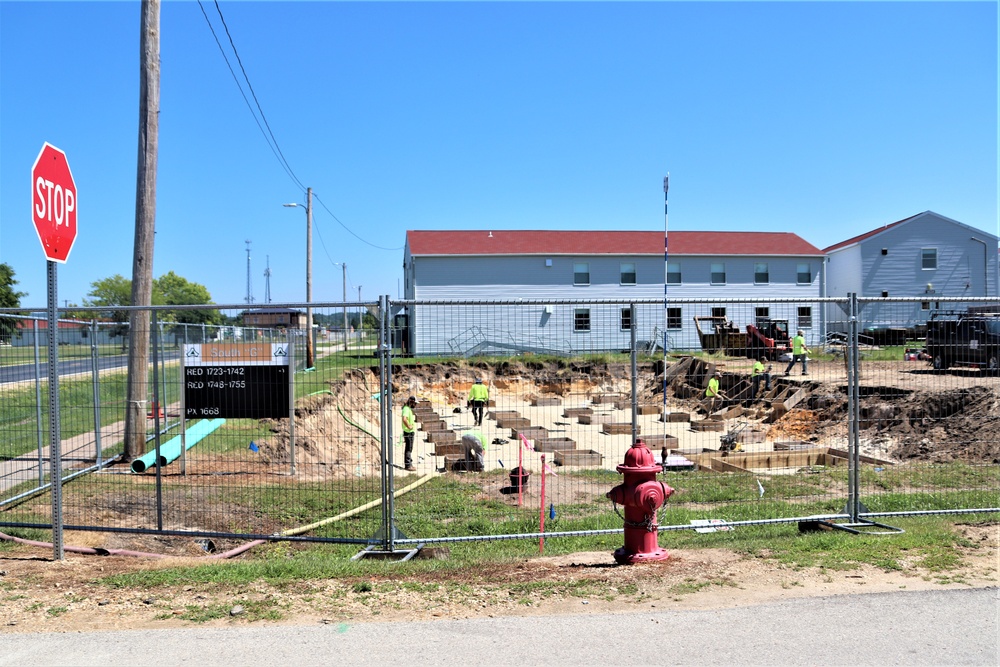 Work to build new foundations for relocated World War II-era barracks under way at Fort McCoy