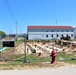 Work to build new foundations for relocated World War II-era barracks under way at Fort McCoy