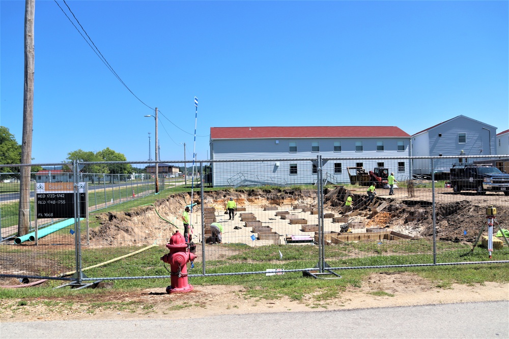 Work to build new foundations for relocated World War II-era barracks under way at Fort McCoy