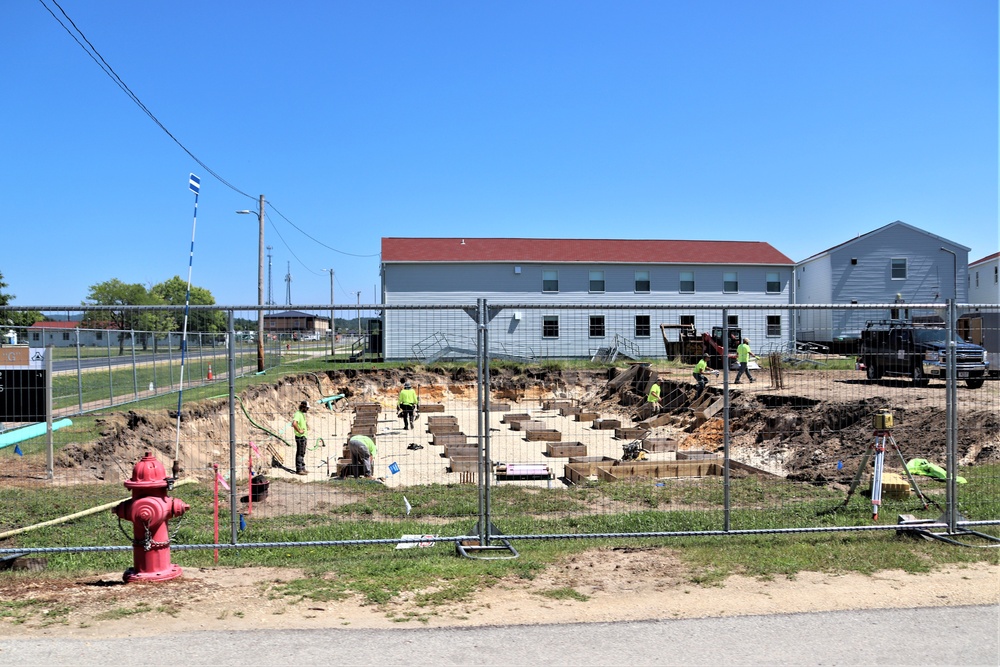 Work to build new foundations for relocated World War II-era barracks under way at Fort McCoy