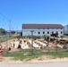 Work to build new foundations for relocated World War II-era barracks under way at Fort McCoy