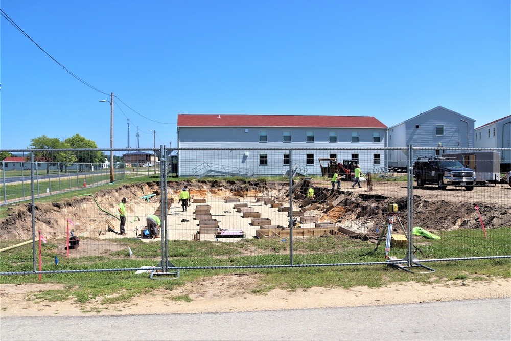 Work to build new foundations for relocated World War II-era barracks under way at Fort McCoy