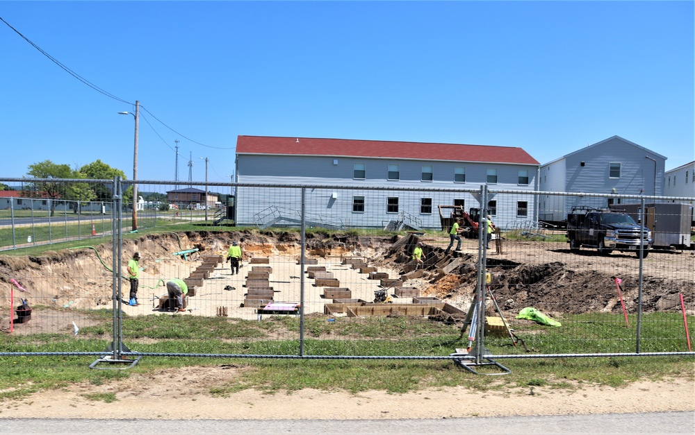 Work to build new foundations for relocated World War II-era barracks under way at Fort McCoy