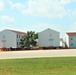 Work to build new foundations for relocated World War II-era barracks under way at Fort McCoy