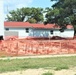 Work to build new foundations for relocated World War II-era barracks under way at Fort McCoy