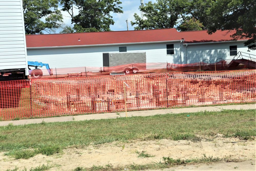 Work to build new foundations for relocated World War II-era barracks under way at Fort McCoy