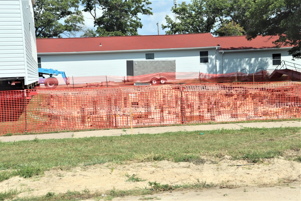 Work to build new foundations for relocated World War II-era barracks under way at Fort McCoy