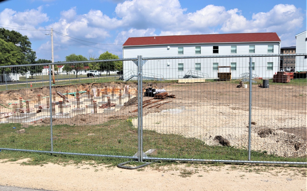 Work to build new foundations for relocated World War II-era barracks under way at Fort McCoy