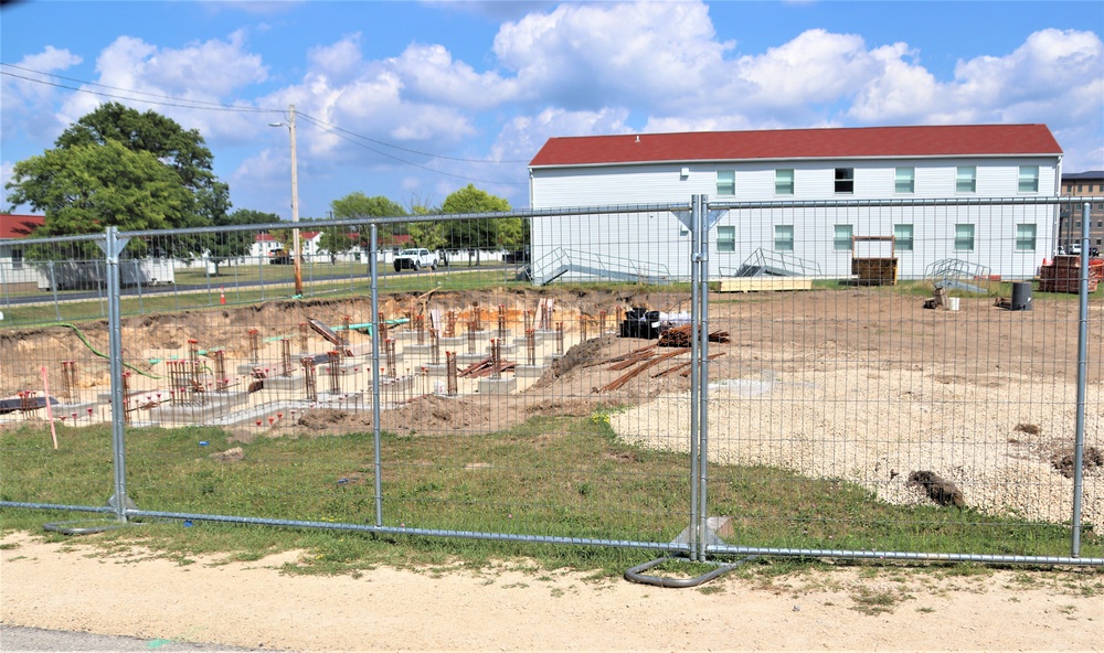 Work to build new foundations for relocated World War II-era barracks under way at Fort McCoy